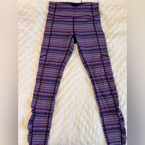 Lululemon purple striped running tights, size 4
